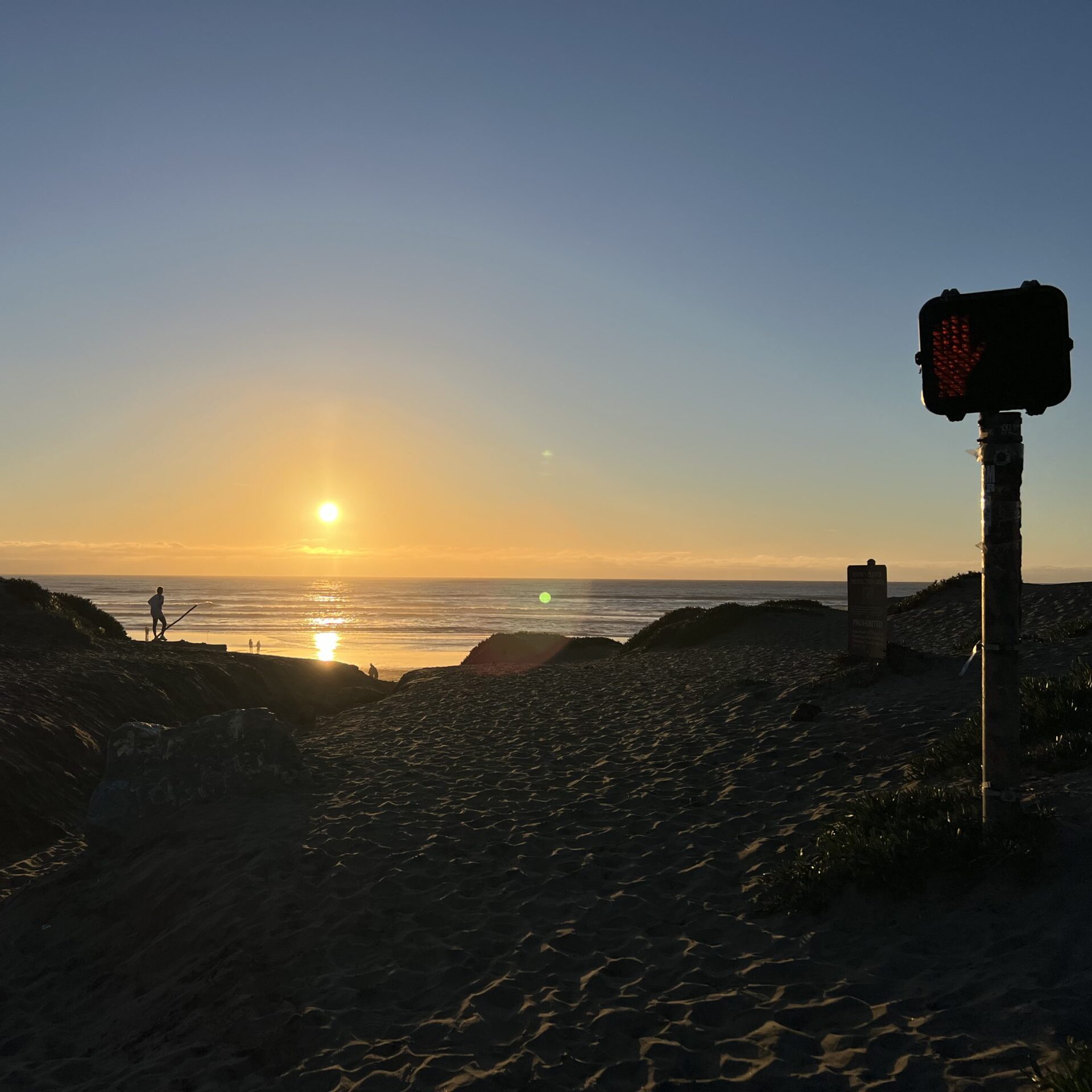 Picture facing west during sunset at ocean beach in San Francisco with the words "About Carlos" written over it. #ADHD #ADHDCOACHING #ADHDSUPPORT #LIFECOACHING #BAYAREA